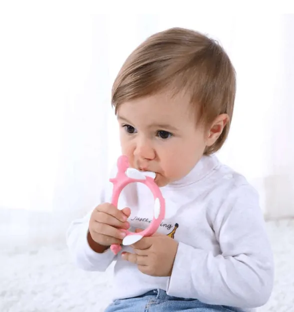 Hryzátko Smily Mia Dinosaurus - Light pink